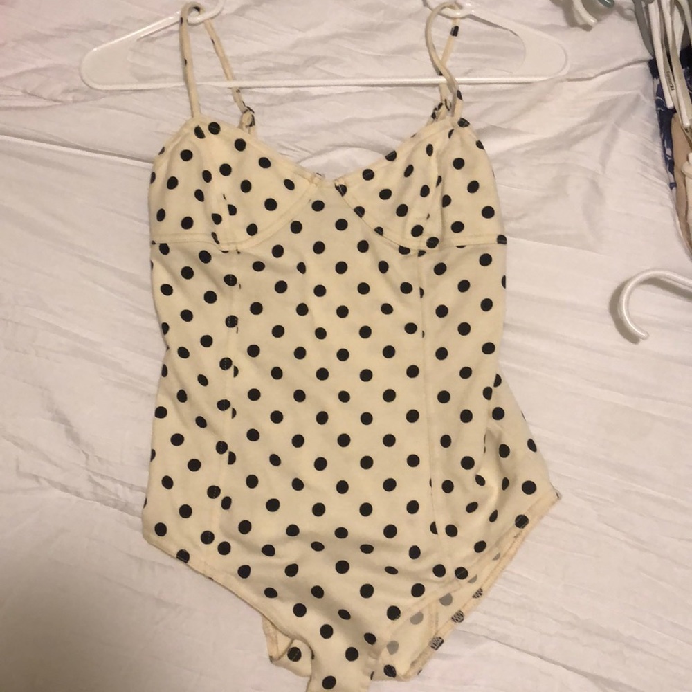 Cream and black polka dot bodysuit